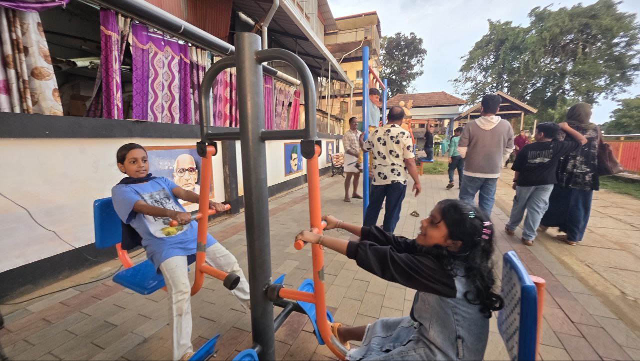 Children playing on seesaw at EMS Park
